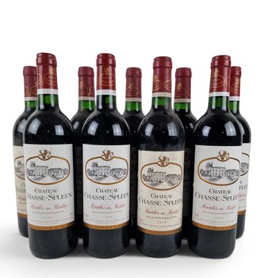 six bottles of red wine are lined up in a row