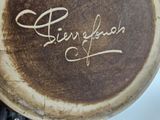 a close up of a plate with writing on it