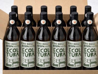 six bouteilles d'Ecopele Tratata dans une boîte en carton