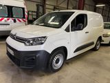 a white van that is parked in a garage