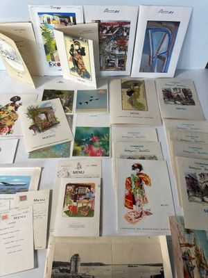 a lot of cards and postcards on the table