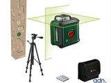 une photo d'un niveau laser vert, avec un appareil photo et un trépied