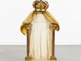 an image of a statue of a woman with a crown on her head