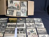 a box of old postcards sitting on a table