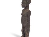 an image of a statue of a man with a hat on his head