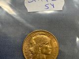 a close up of a coin in a plastic bag on a table