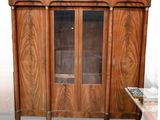 an image of a wooden cabinet with glass doors