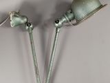 paire d'appliques murales vintage de style industriel en forme de deux lampes
