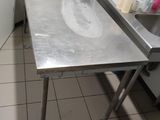 an image of a kitchen with a sink and a counter