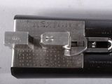 a close up of a metal object with a metal latch