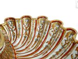 a decorative bowl that is sitting on a table