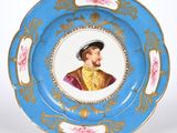 a blue plate with a picture of a man on it