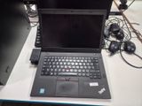 a laptop that is sitting on a desk with a mouse