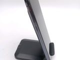 a close up of a cell phone on a stand