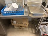 many containers and containers that are sitting on a kitchen counter