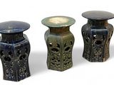 three different types of vases sitting on top of a white surface