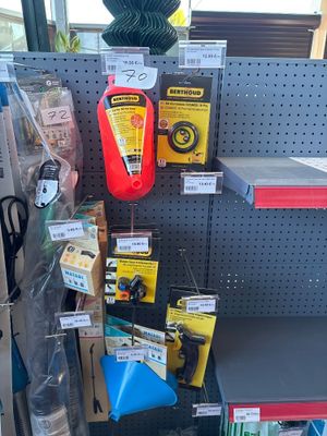 many items on the shelf in the store for sale