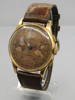 une image d'une montre-bracelet avec un bracelet en cuir marron