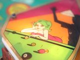 a close up of a pinball game on a table