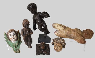 several figurines of different shapes and sizes are displayed on a table