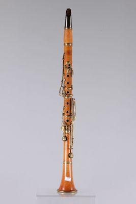 a clarinet with a wooden body and a black top