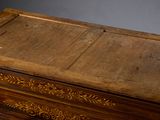 a wooden box with a drawer on top of it