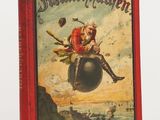 a red book with a picture of a man riding on top of a ball