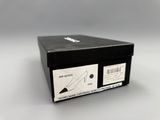 the box is black and has a white label on it