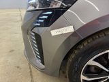 a close up of a car with a sticker on the front of it
