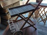 a wooden chair that is sitting on a porch
