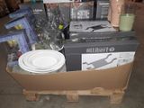 a box with a bunch of items in it on a pallet