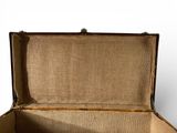an open suitcase that is sitting on a white surface