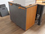 a printer sitting on top of a desk in an office