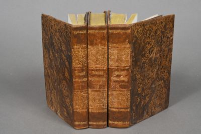 two books that are sitting on a table together