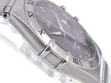 a silver watch with roman numerals on the face