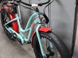 a bike that is parked next to a wall