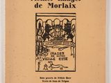 an old book with a picture of a village on it