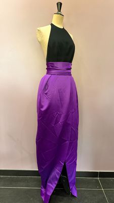 a woman ' s purple skirt on a mannequin mannequin mannequin mannequin mannequin mannequin mannequin mannequin