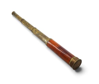 an old telescope with a wooden handle on a white surface