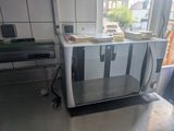 a toaster sitting on top of a counter in a kitchen