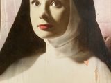 an old photo of a nun in a white robe with a red lip