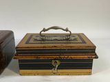 two wooden boxes with handles and handles sitting next to each other