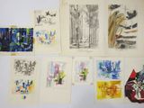 a lot of drawings on the wall of a room