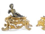 pair of antique bronze figurines of a boy and a girl