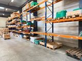 a large warehouse filled with lots of boxes and pallets