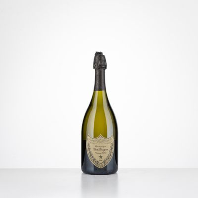 a bottle of champagne sitting on top of a table