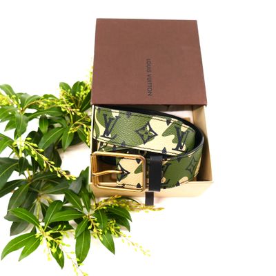 a box with a belt and a box of flowers