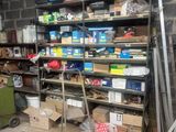 many boxes and boxes on the shelves in the garage