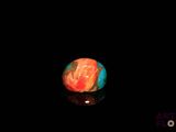 a picture of a close up of a small object in the dark