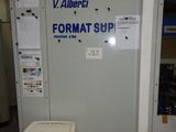 an image of a refrigerator and a trash can in a room
